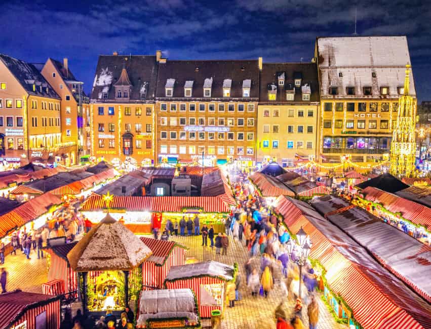 Nuremberg germany best christmas markets in europe at night with golden lights and histoic buidlings in background