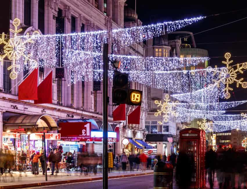London best christmas markets in europe at night with golden lights and histoic buidlings in background