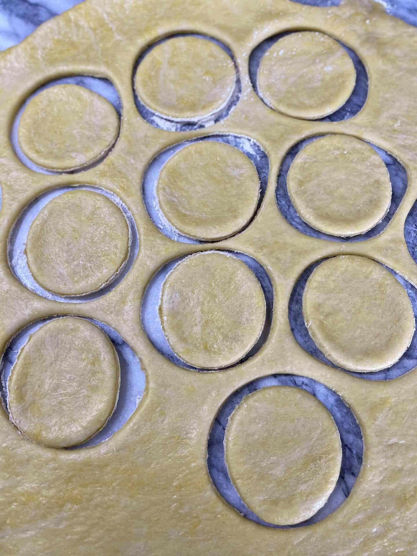 Learn how to make Trogirski Rafioli! A traditional Croatian dessert with rich almond filling and a sweet taste of Trogir.