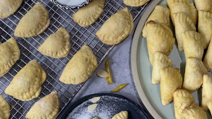 Taste the sweet side of Dalmatia with these delicious Trogirski Rafioli, traditional almond-filled cookies from Trogir, Croatia. Learn their romantic history and bake this authentic Croatian dessert at home. 🇭🇷✨