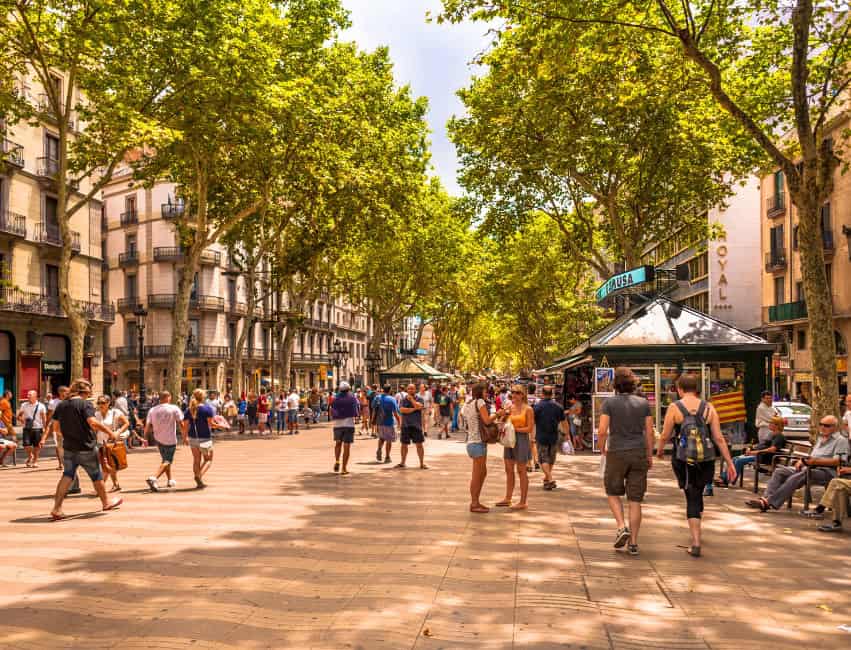 La Rambla pedestrian street in Barcelona, Spain &ndash; lively tourist attraction with shops, cafes, and landmarks