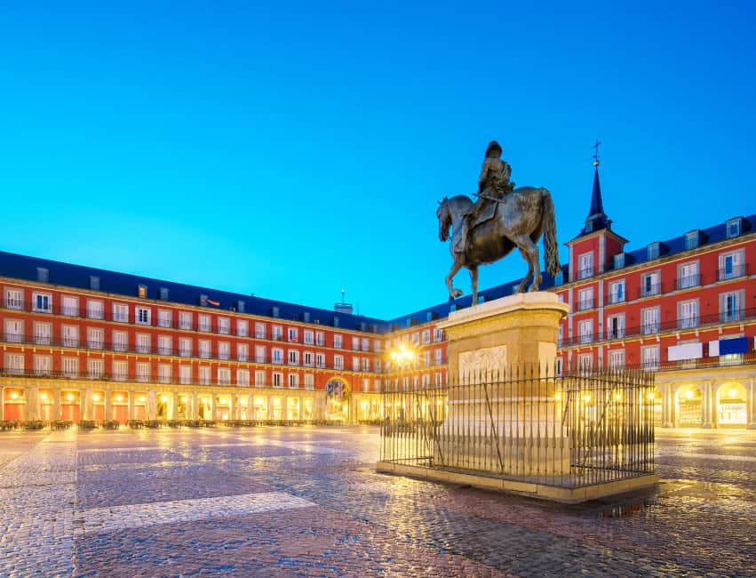 Plaza Mayor in Madrid, Spain &ndash; famous square and landmark surrounded by historic Spanish buildings.