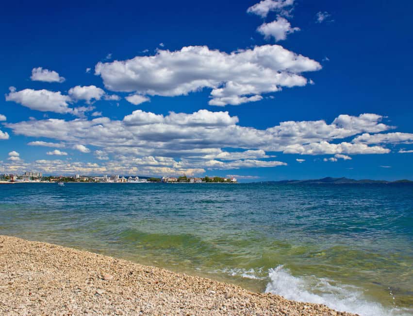 Beach Zadar Croatia clear water and pebble shoreline&rdquo;