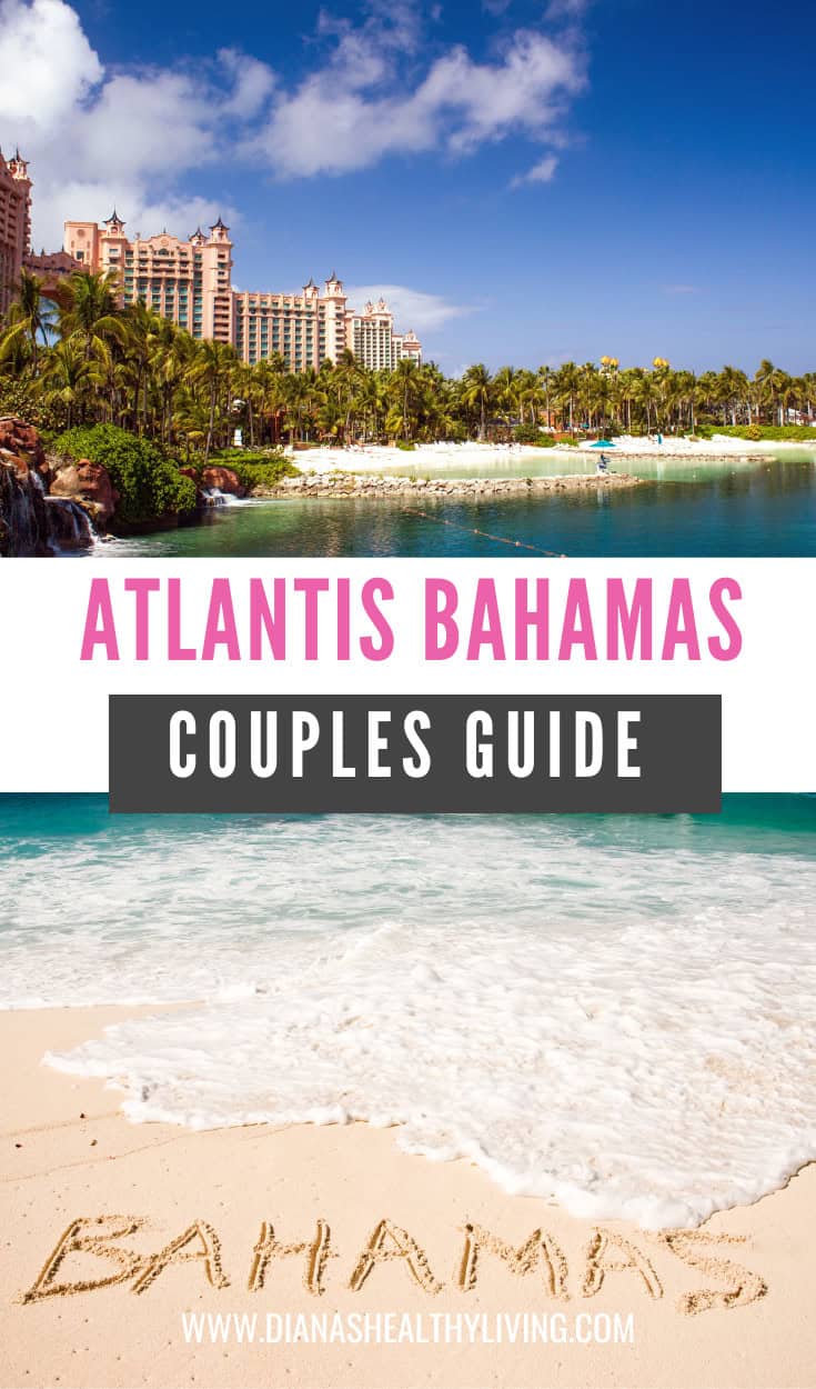 Vibrant Atlantis Bahamas beach with resort buildings and lush palm trees.