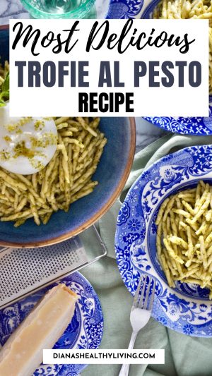 trofie al pesto Trofie alla Genovese plated on blue plate with burata cheese