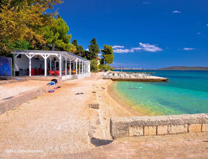 Ka&scaron;telet Beach Split Croatia pebble cove near Me&scaron;trović Gallery with calm turquoise sea&rdquo;