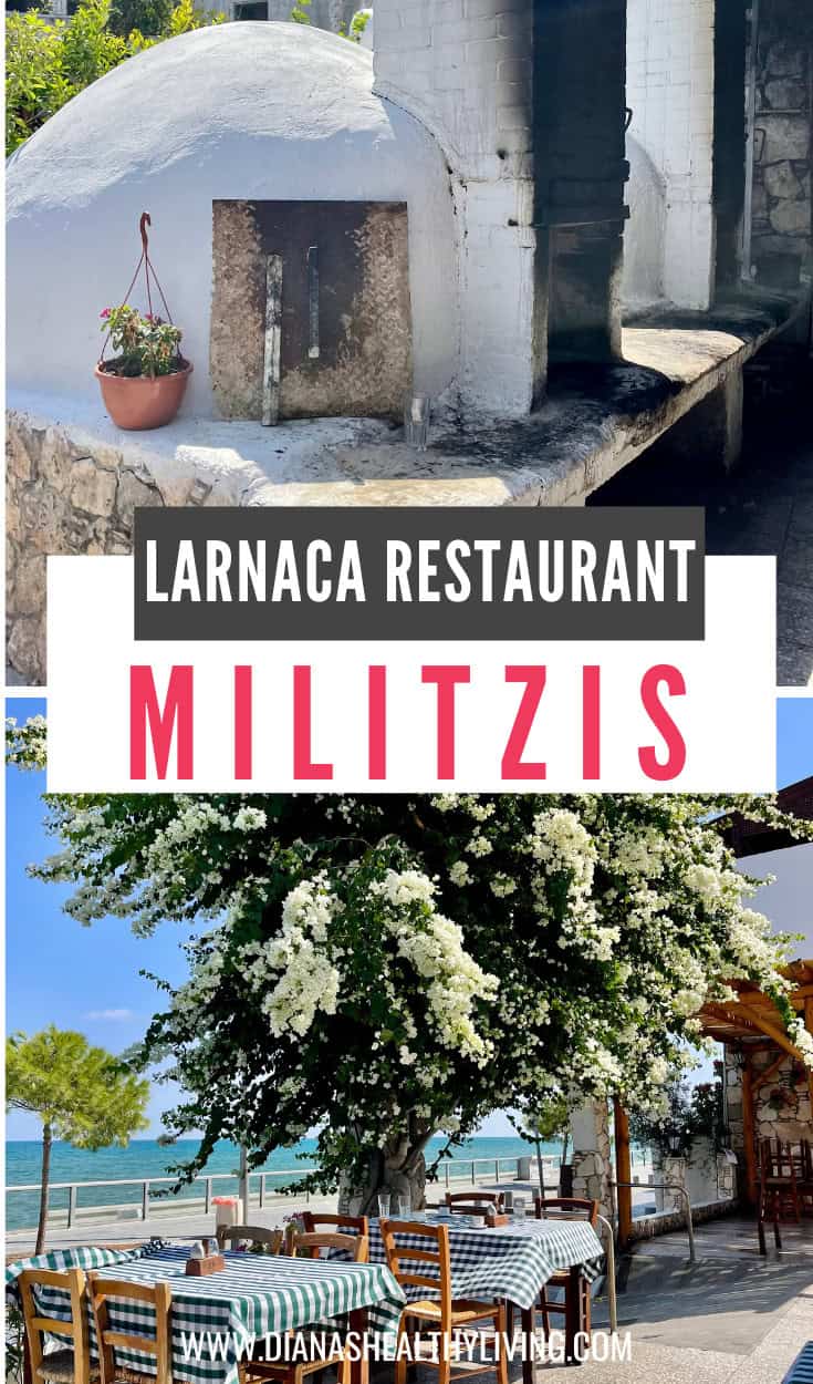 Traditional Larnaca restaurant outdoors with flowers and seating by the sea.