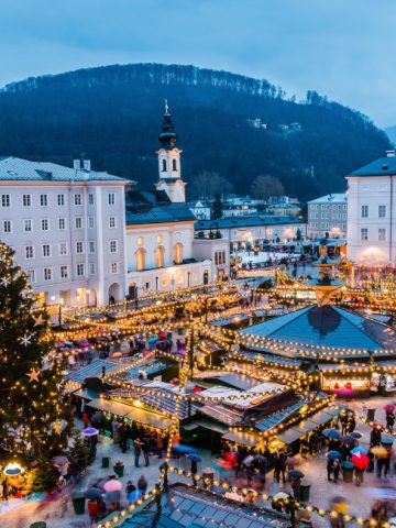 Festive Christmas market in Salzburg with holiday lights and decorated trees, ideal for healthy living holiday traditions.