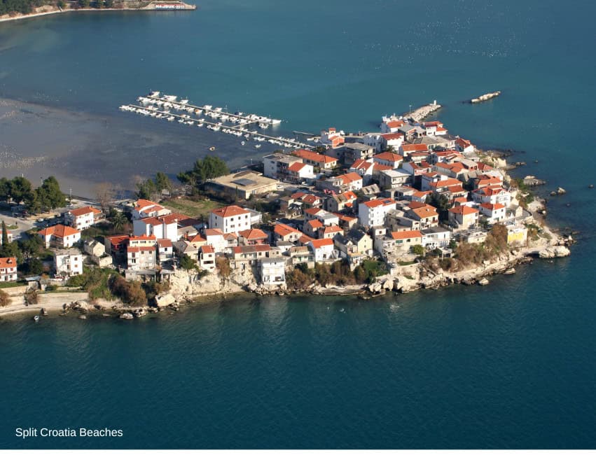 Stobreč Jug Beach near Split Croatia quiet pebble beach with village atmosphere and clear sea