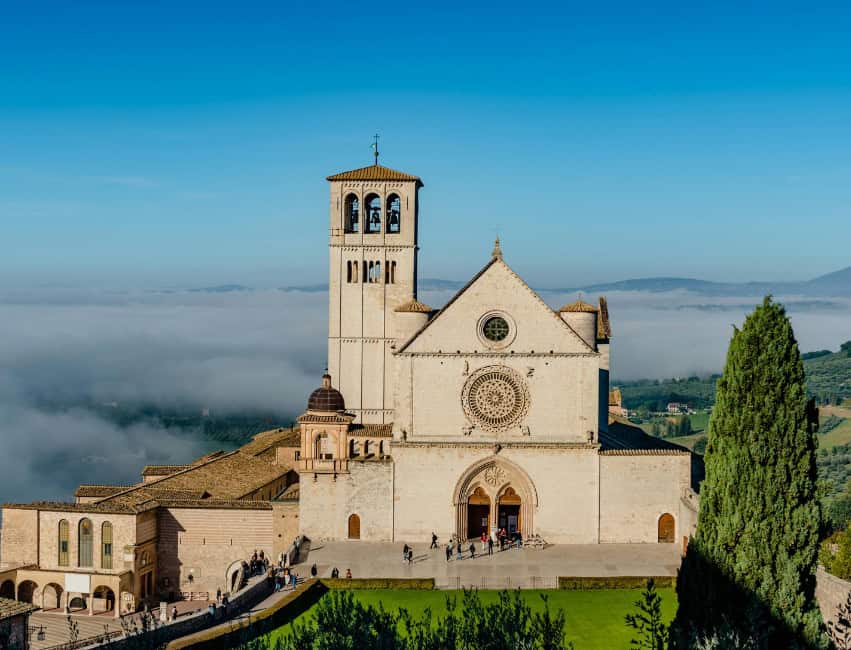 Basilica of St. Francis in Assisi with winter skies and peaceful surroundings