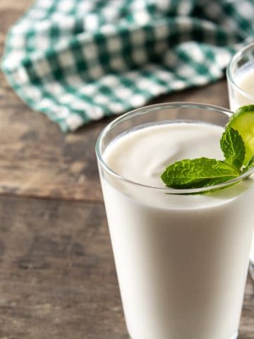 Discover the refreshing taste of Ayran Yogurt in Cyprus — a traditional Turkish yogurt drink made with yogurt, water, and salt. Learn about its history, Cypriot variations, cultural roots, and how to make Ayran at home.