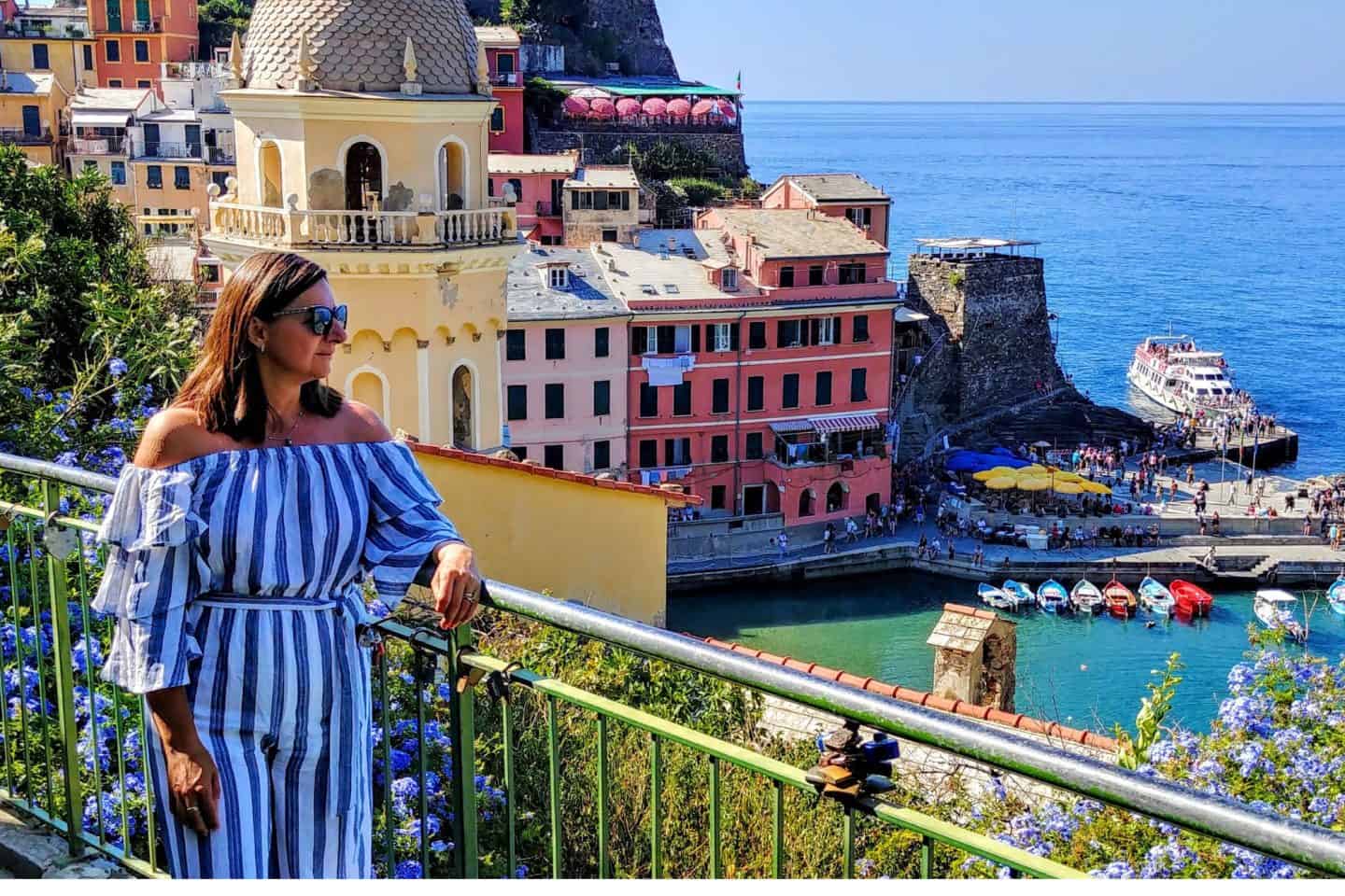 Colorful houses of Cinque Terre Italy — one of the prettiest places in Italy overlooking the Ligurian Sea.