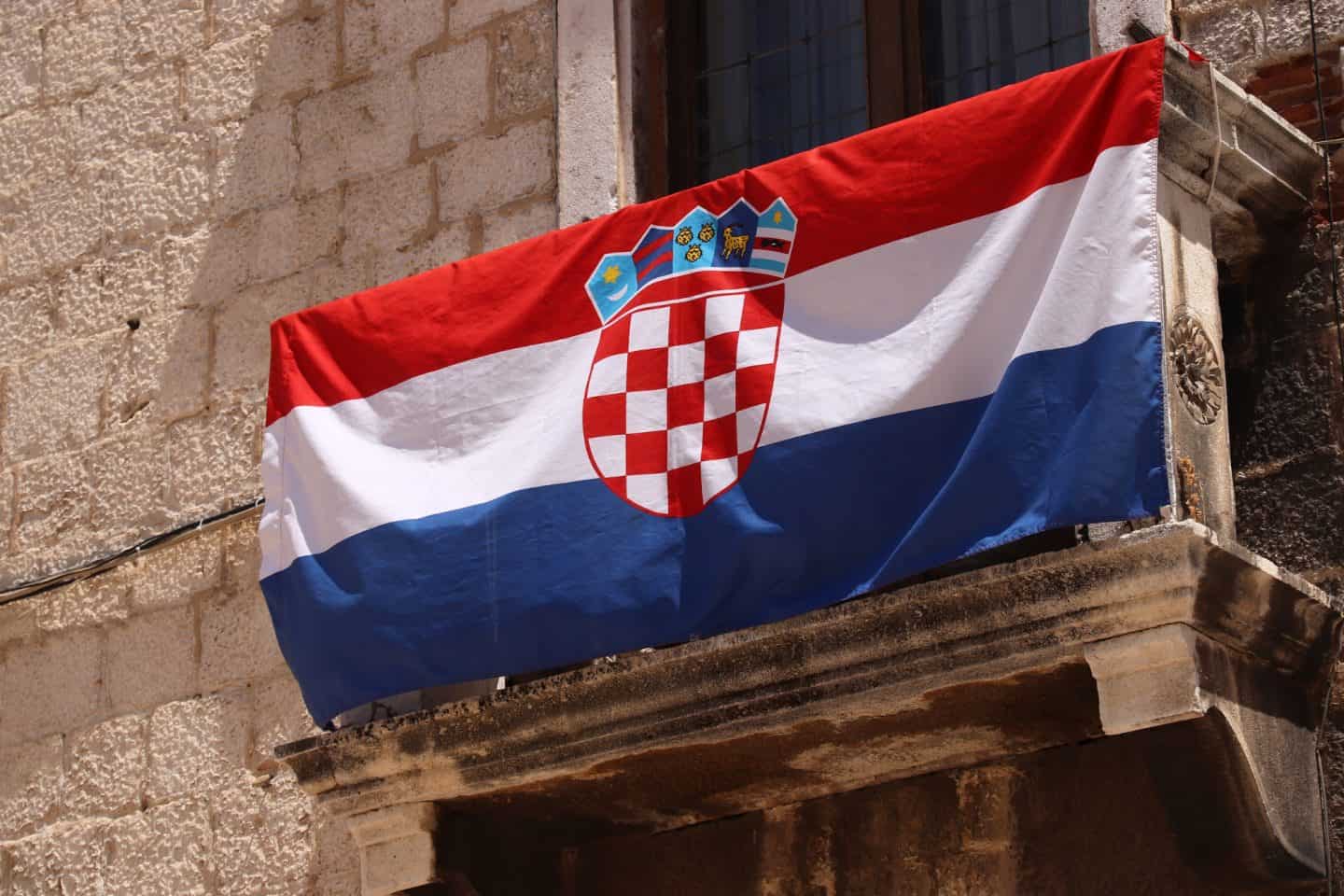Croatian flag over balconies in Croatia on Statehood Day, May 30, Dan državnosti.