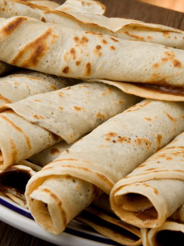 Discover the beloved Croatian palačinke — soft, golden crepes that taste like home. From sweet Nutella-filled rolls to savory cheese-stuffed versions, these Balkan pancakes are simple, nostalgic, and unforgettable. Includes traditional recept za palačinke, tips for perfect texture, and family memories from Croatia.