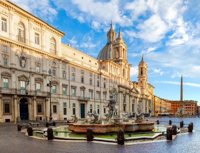 Piazza Navona with Baroque fountains and Christmas market stalls during winter rome in winter