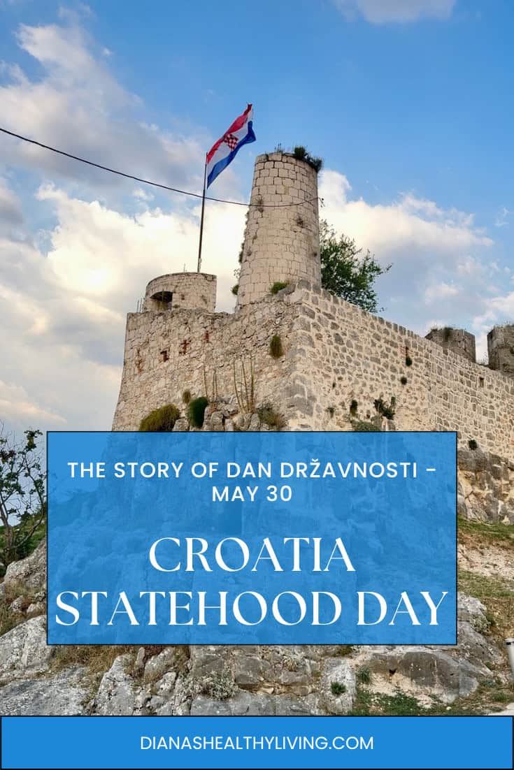 Croatian flag flying over klis fortress on Statehood Day, May 30, Dan državnosti.