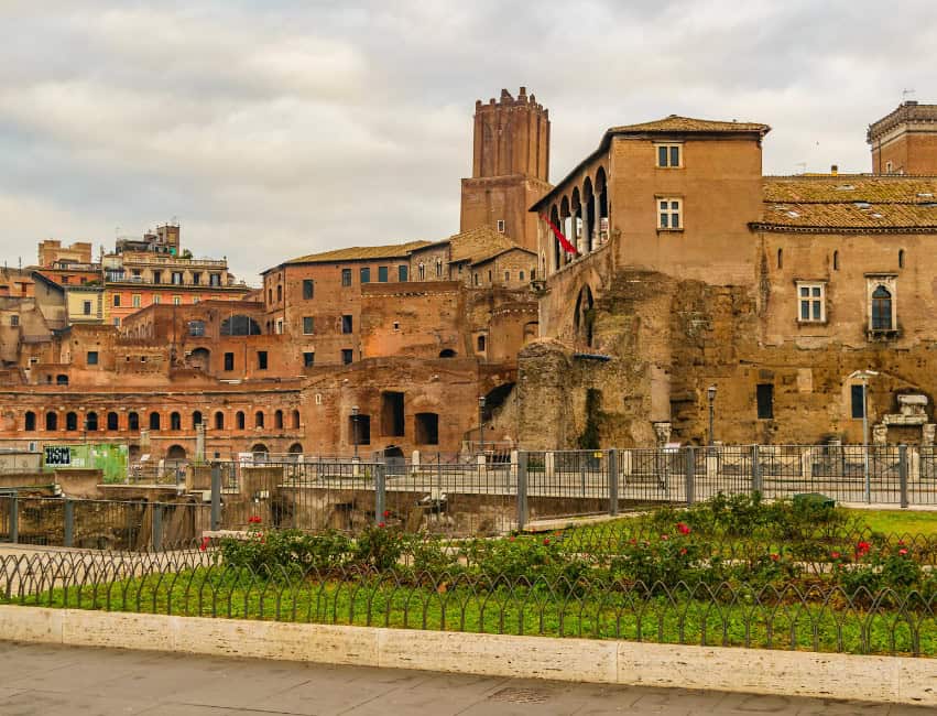 Ruins of Trajan’s Market in Rome with ancient brick walls and arches on a clear winter day