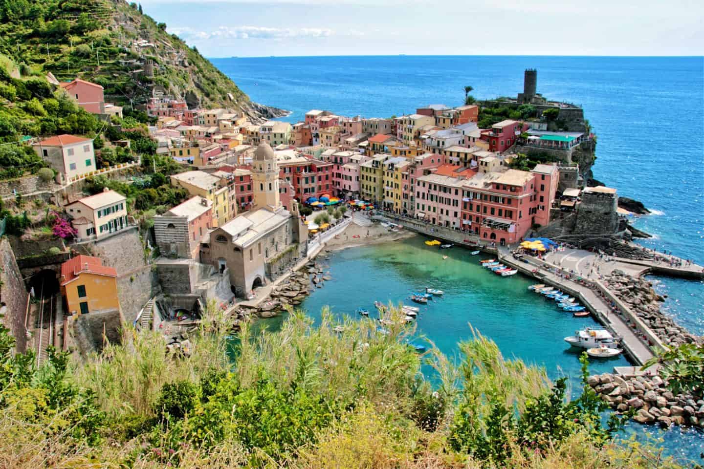 Tucked along Italy&rsquo;s Cinque Terre coast, Vernazza is a pastel paradise of sea views, wine terraces, and secret coves. Discover where to stay, what to eat, and why this tiny village is the most beautiful spot in Cinque Terre.
