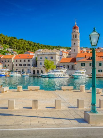 Pucisca Brac Croatia white stone village overlooking calm turquoise bay