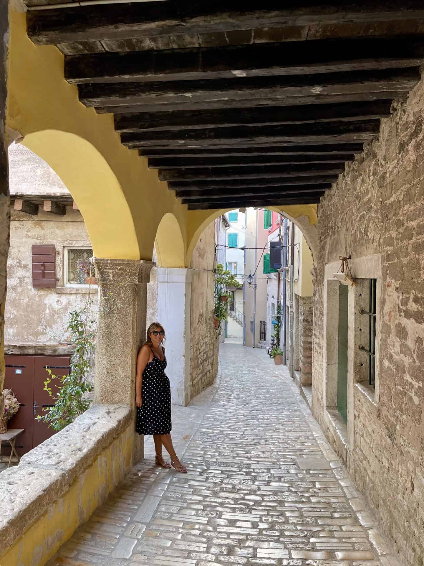 Narrow Rovinj streets with stone steps and colorful houses