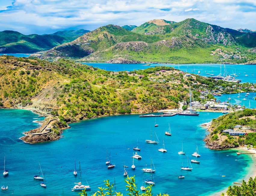 aerial view of antigua island with boats in the ocean best caribbean islands to visit