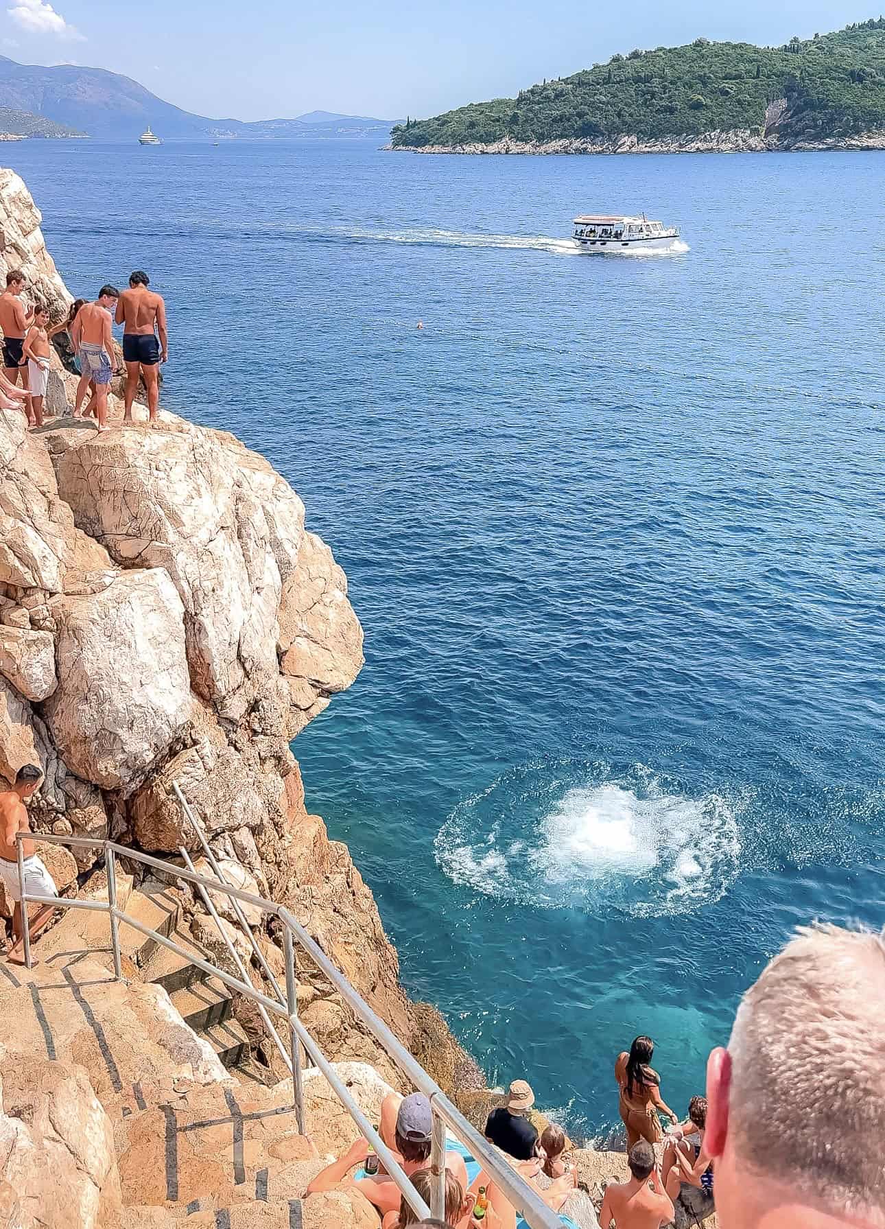Cliffside jumping into the Adriatic Sea from Buža Bar Dubrovnik
