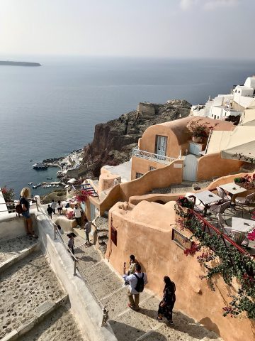 aerial view of oia santorini greece stairs and colourful buildings